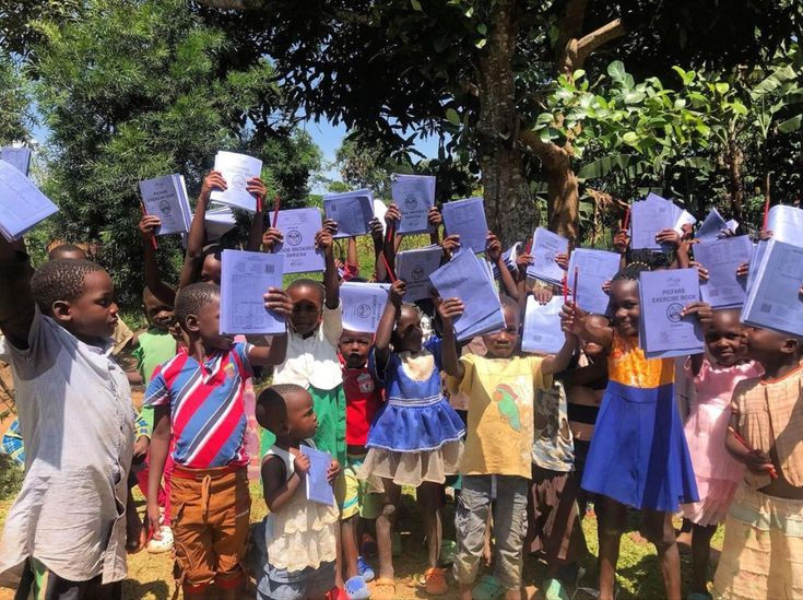 Students receiving scholastic materials